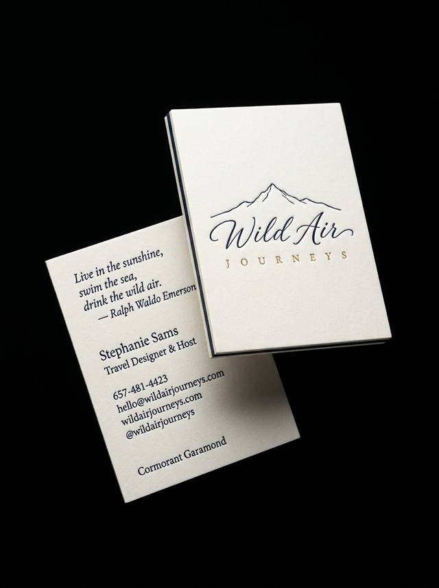 The Triptych concept: 32pt warm white cotton triplex with navy core · deep letterpress · triplex with unpainted edge reveal