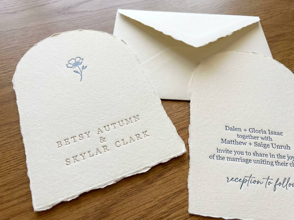 Arch with Blind Deboss and Foil Frame concept: Cream handmade 350gsm · Die-cut arch · Ripped edges