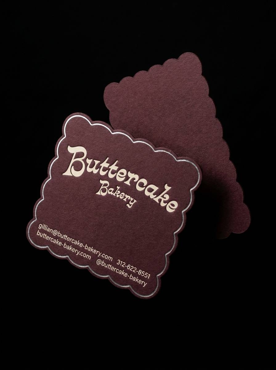 The Foil Scallop Wave concept: 32pt Black Cherry Chocolate uncoated · hot foil satin silver edge · letterpress cream