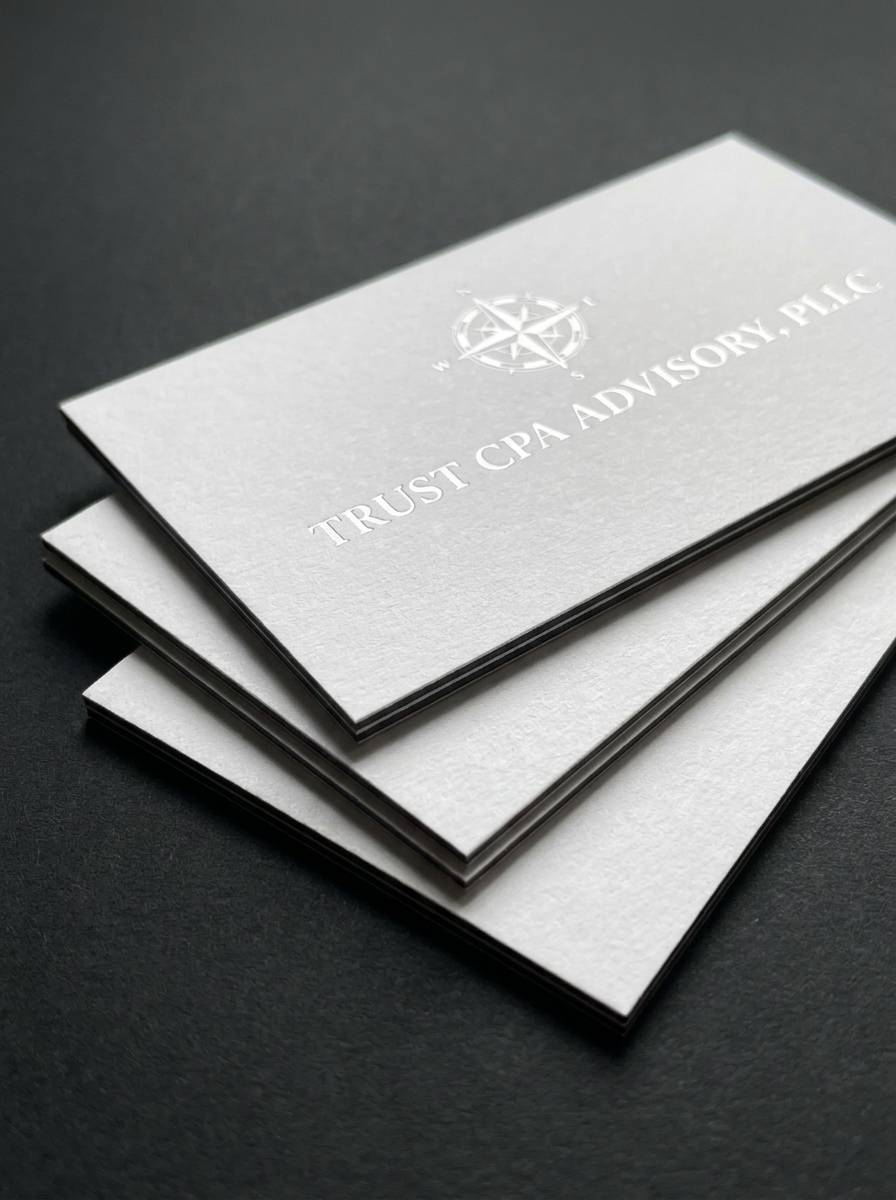 The Contrast concept: 32pt white 100% cotton + charcoal duplex · white foil · duplex lamination reveal