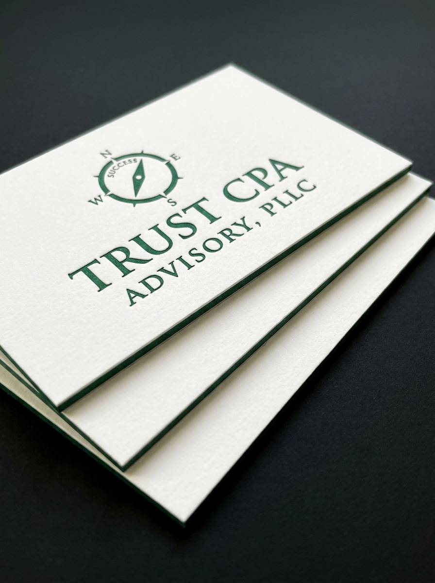 The Art Director's Push concept: 32pt white uncoated cotton + 16pt coloured core · deep letterpress reveal, duplex edge