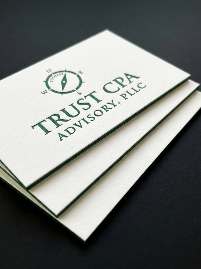 The Art Director's Push concept: 32pt white uncoated cotton + 16pt coloured core · deep letterpress reveal, duplex edge