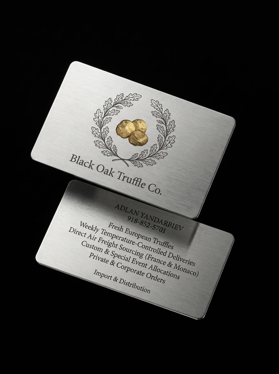 The Stainless Metal Statement concept: stainless steel, 0.5mm · chemical etching (shadow typography and wreath) · antique gold foil (emblem fill only)